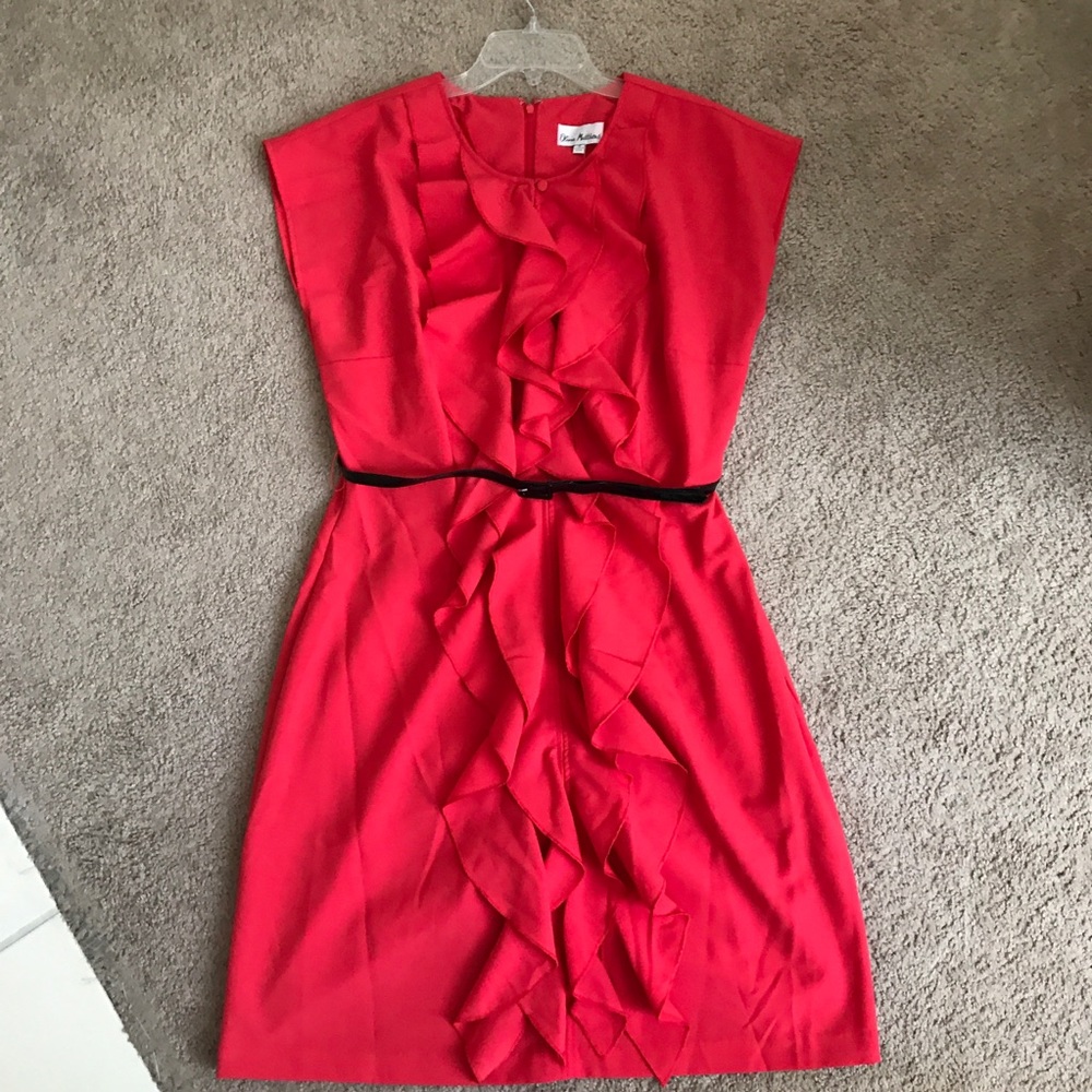 Sleeveless coral dress with ruffle down front